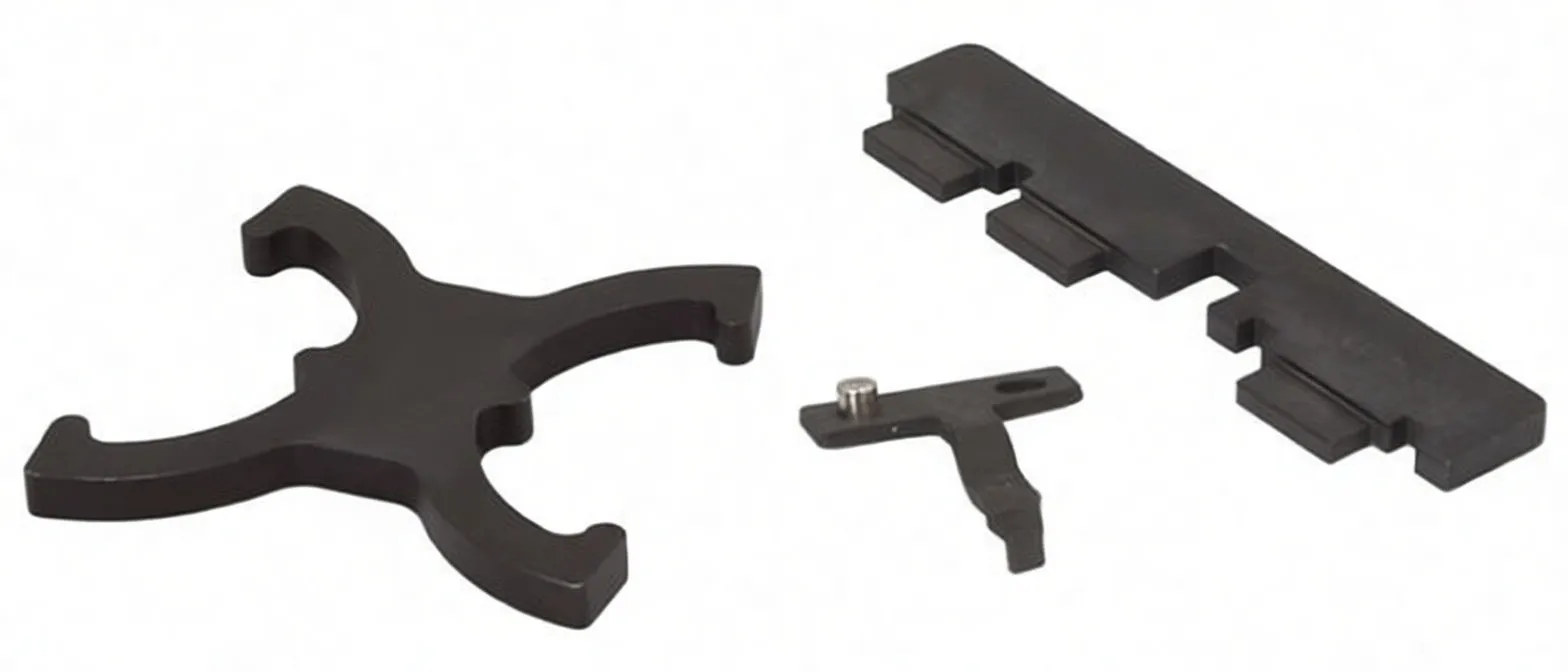 Three black timing tools on white background: X‑shaped cam lock, rectangular spacer with notches, small bracket with pin and printed markings