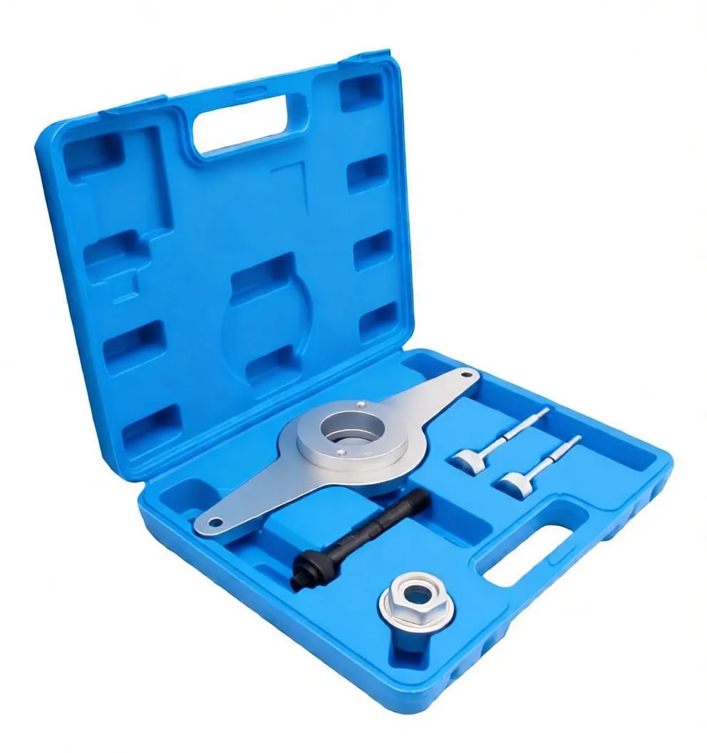 Top view of tools in blue case showing circular two‑arm adapter, black threaded shaft, knurled pins and nut adapter.