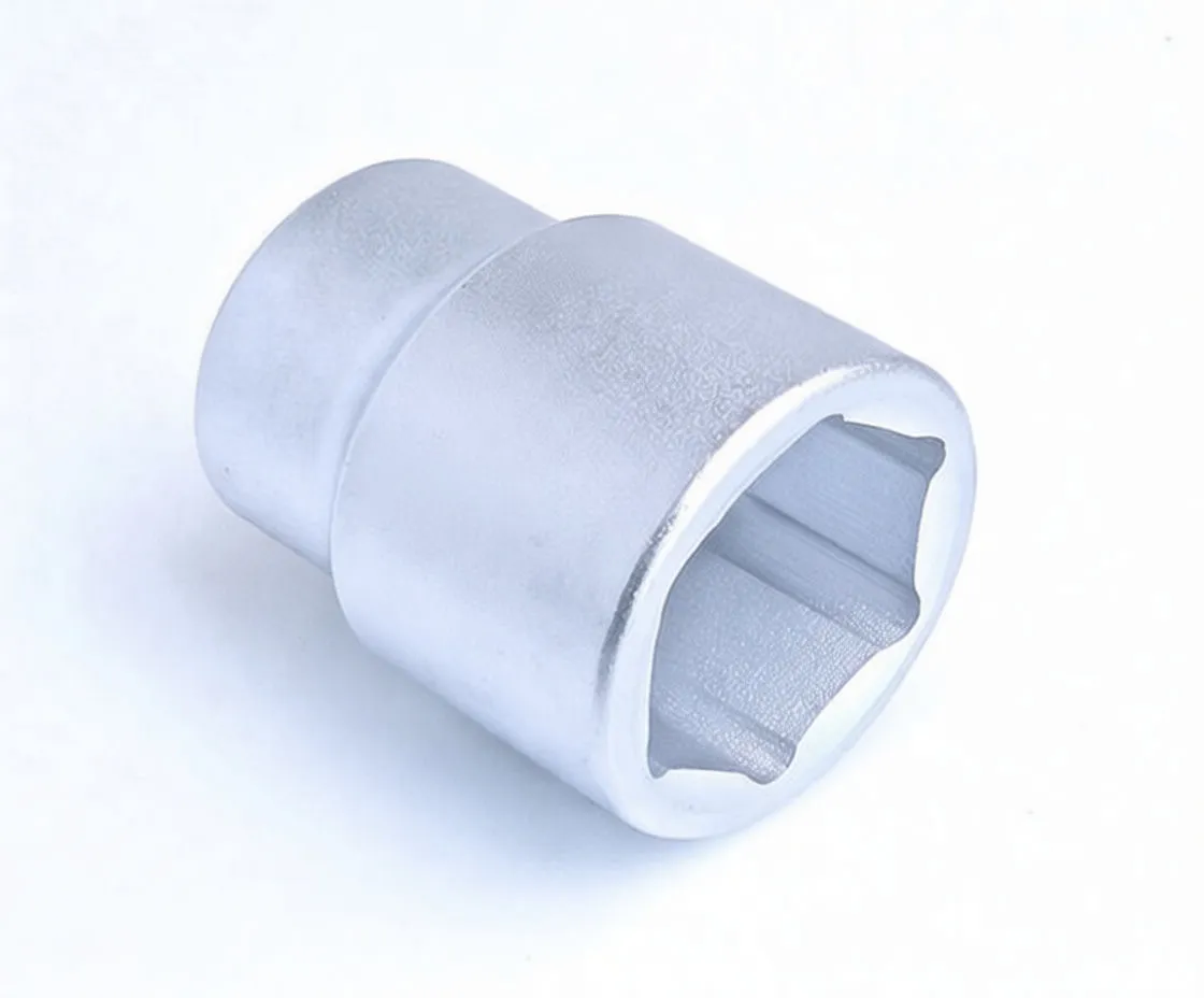 Side view of chrome ASTA six-point socket showing hex interior, stamped markings and square drive