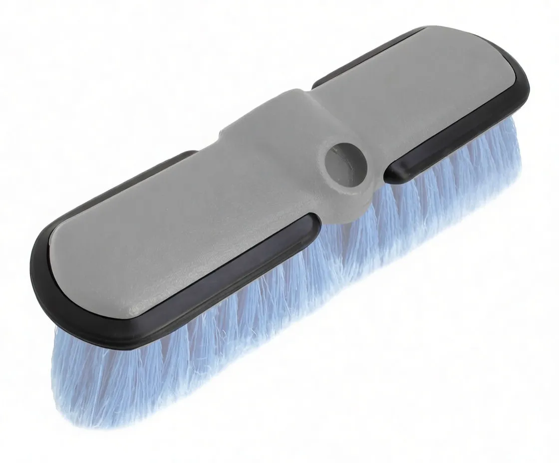 Closeup of brush head bristles and swivel joint with arrow indicating rotation