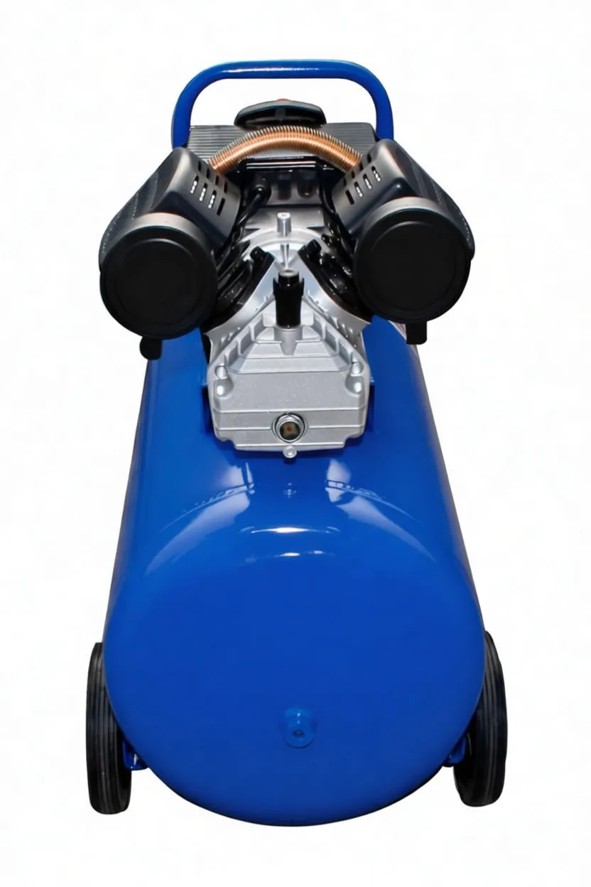 Top-to-front view of compressor highlighting twin cylinder heads, central pump housing and top handle