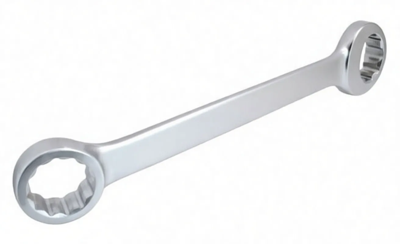 Long angled shot of chrome combination spanner showing open end close-up and box end in distance