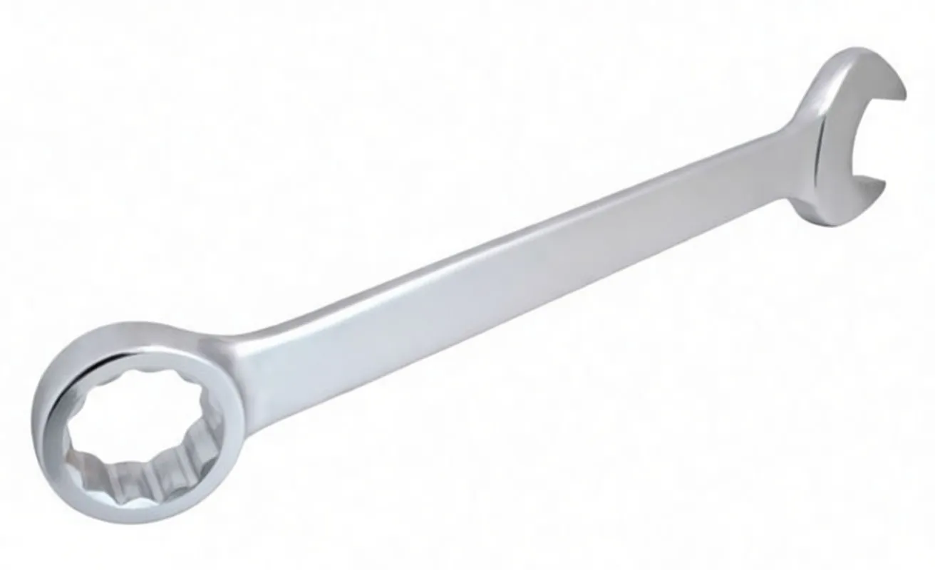 Combination spanner photographed from an oblique angle showing the 12-point ring end in the foreground and the open end in the background, chrome finish and center marking visible.
