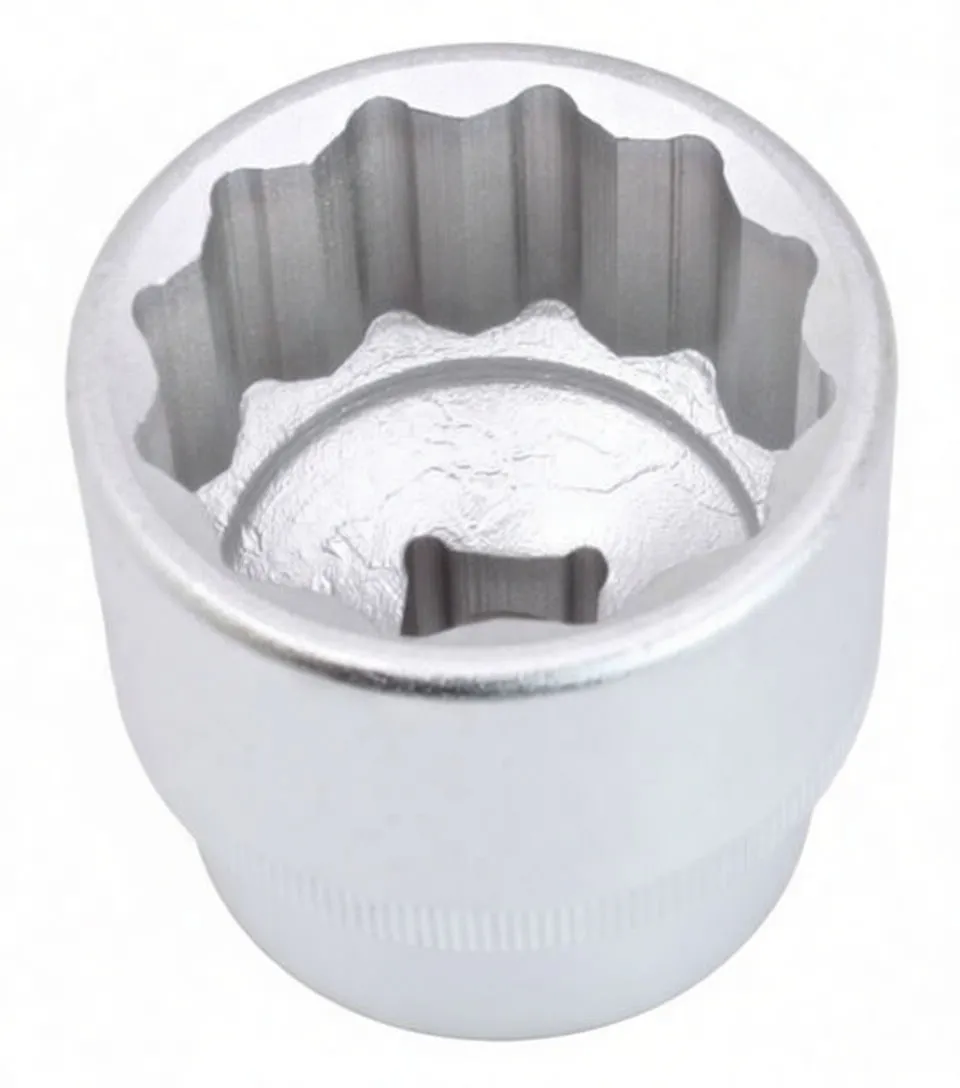 Top view into a 12‑point 38mm socket showing star-shaped internal profile and central square drive recess