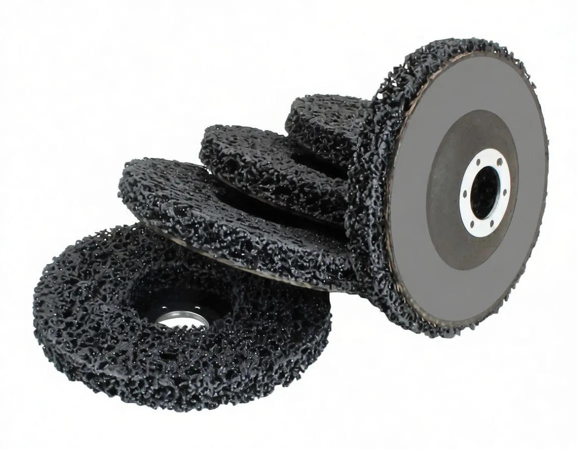 Close-up of stacked black cleaning discs showing blue saTra label, central metal arbor, and model 'S - CDS125'.