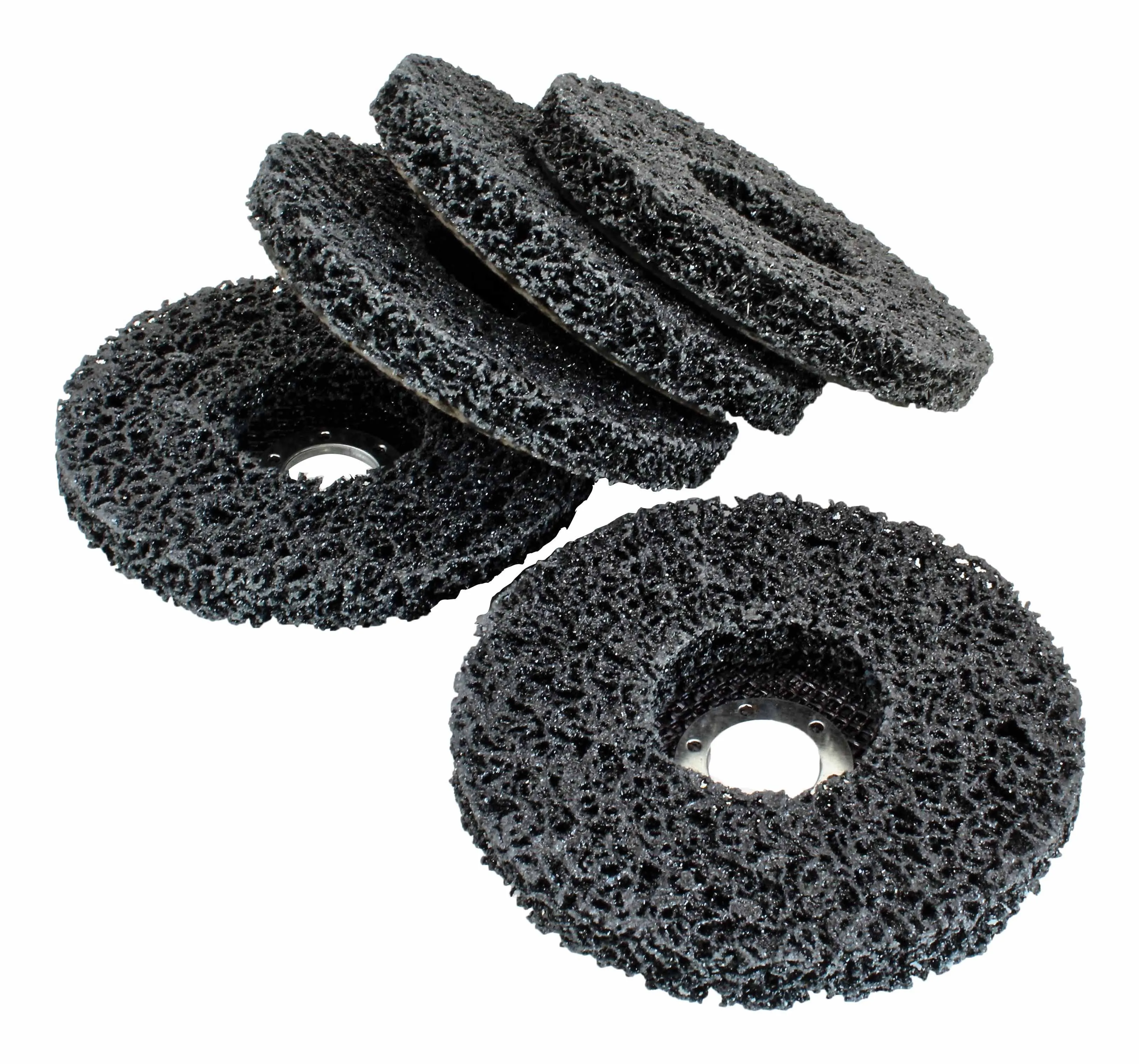 Several black porous cleaning discs laid flat showing textured open-web abrasive surface and central mounting holes.