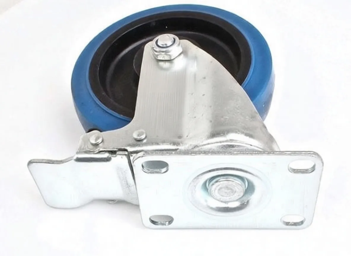 Top view of caster showing square mounting plate with four bolt holes, swivel race, zinc-plated fork, brake lever and blue rubber wheel