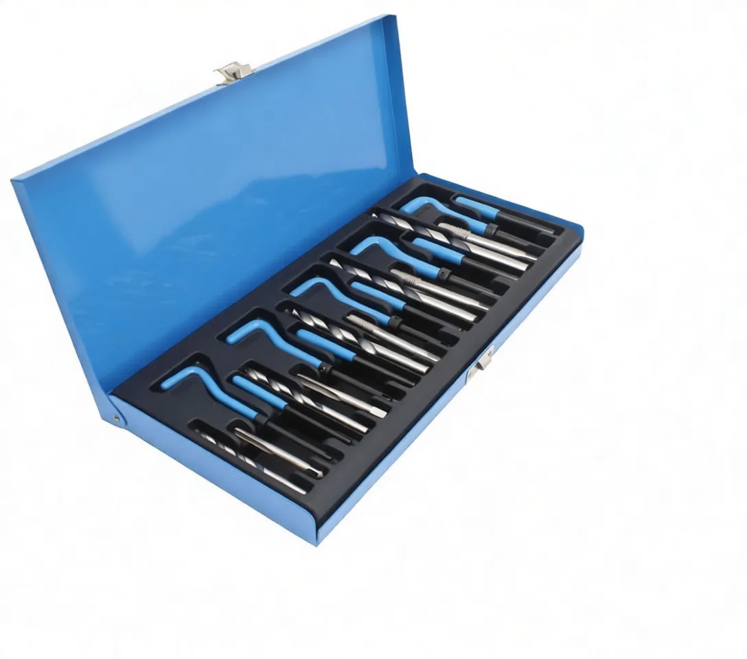 Full frontal view of thread repair set with organized taps, blue insertion handles and bags of coil inserts