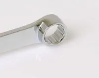 Close-up of the fixed box ring end of the spanner showing 12-point internal profile and polished chrome finish