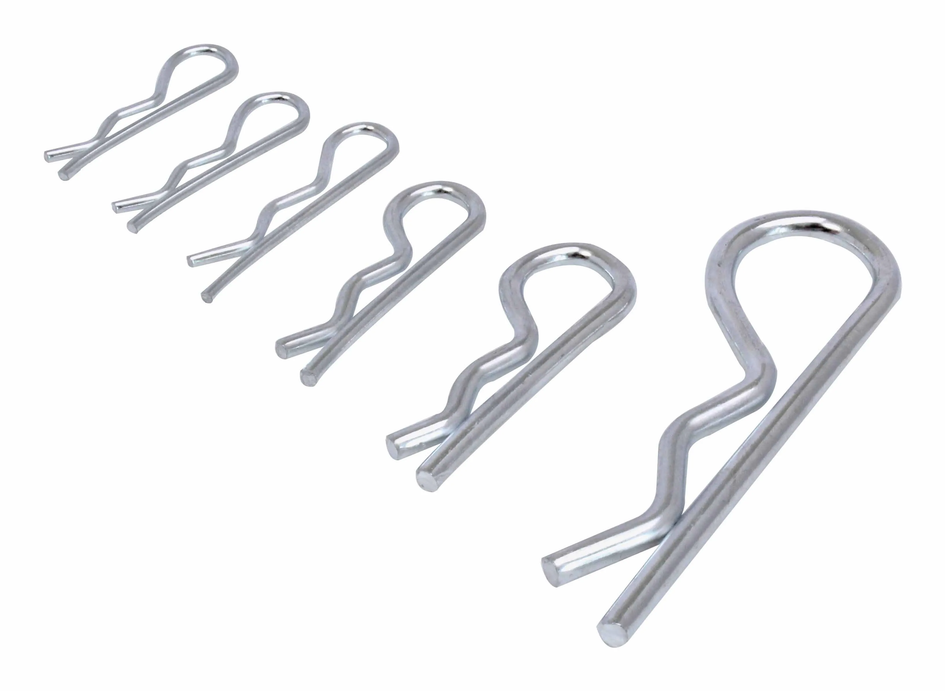 Close-up row of seven metal R-clips in ascending sizes showing looped heads and bent legs