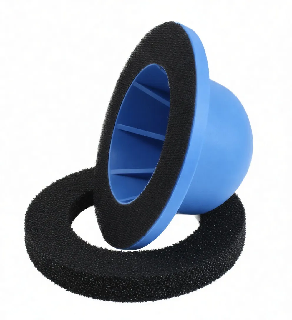 Blue plastic housing of cleaner shown tilted with internal ribs and black hook-and-loop mating surface; separate coarse porous black abrasive ring beside it.