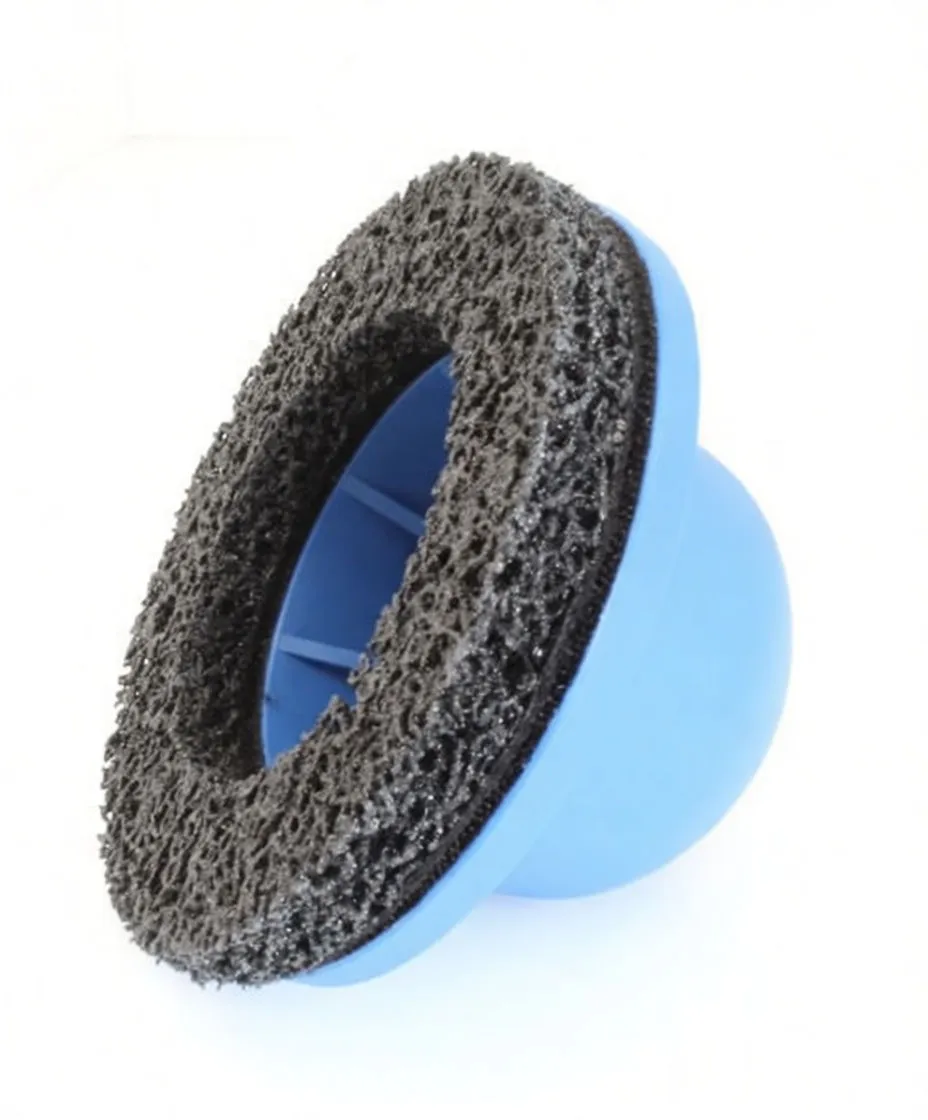 Side/angled view of assembled blue hub cleaner with saTra logo and porous black abrasive cleaning ring seated at the base; inner ribs visible through center opening.