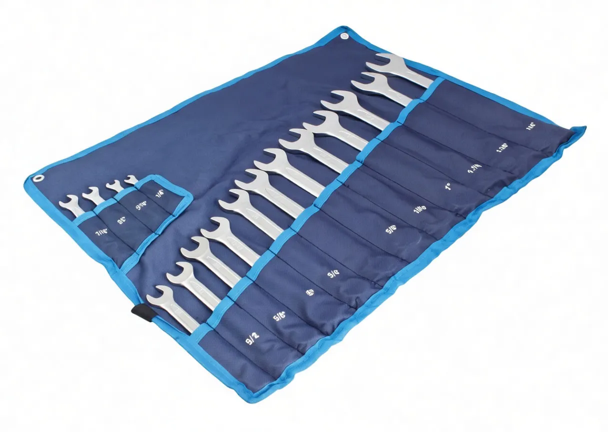 Perspective view of labelled pockets and larger chrome combination spanners in blue roll