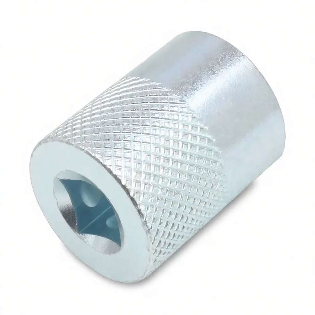 Side perspective of chrome knurled socket showing recessed three-lobed internal end and faint printed marking on the body