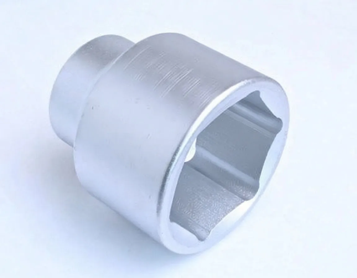 Side view of a 58mm six-point chrome socket showing stamped marking and square drive recess