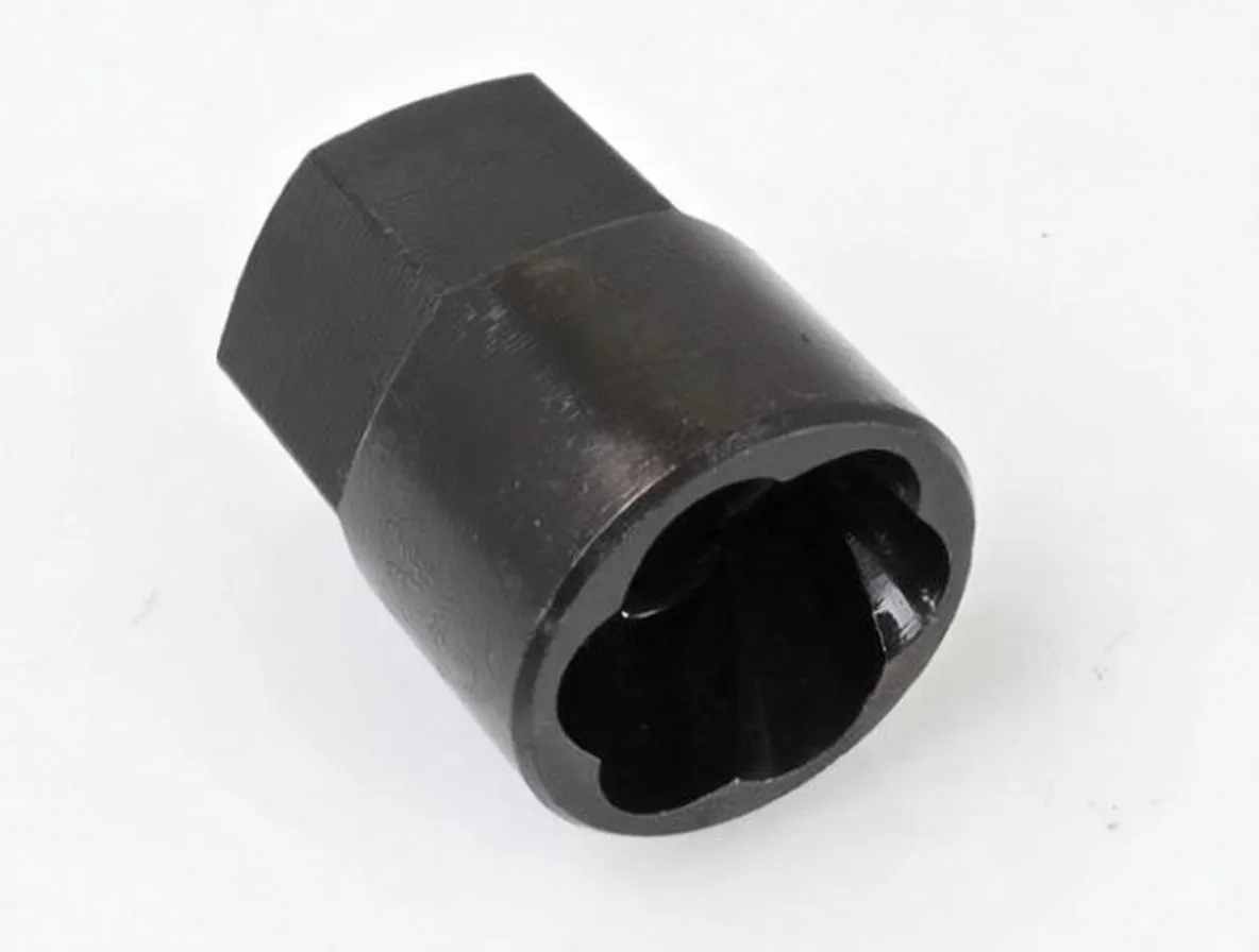 Top-down view of a 21 mm bolt extractor showing internal lobed gripping profile, hex flats and 'S-TSX21 satra' markings.