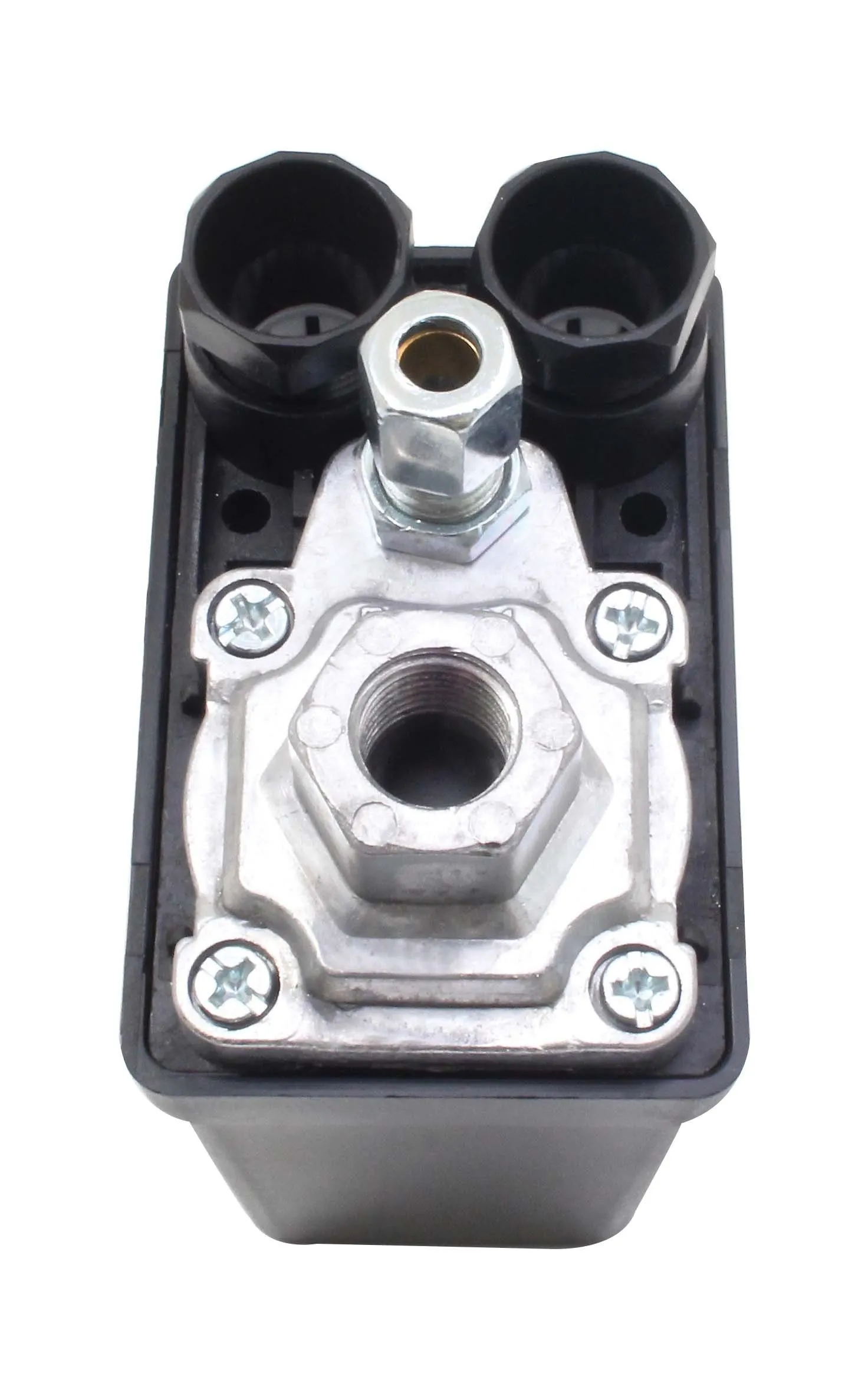 Top view close-up of metal plate with threaded inlet, adjustment stud and cable entry holes