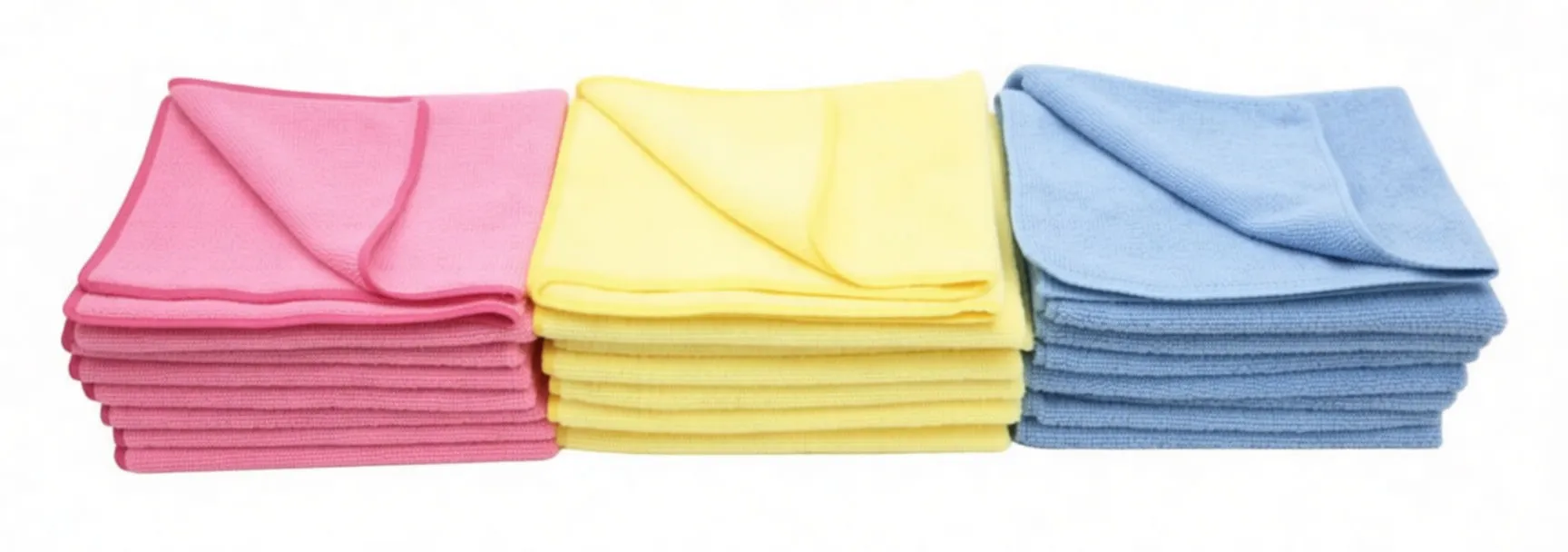 Three stacks of folded pink, yellow and blue microfiber cloths with visible corner folds and small white tags.