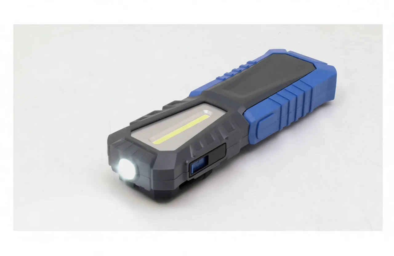 ASTA work light with front spot LED lit, showing COB strip and side port cover
