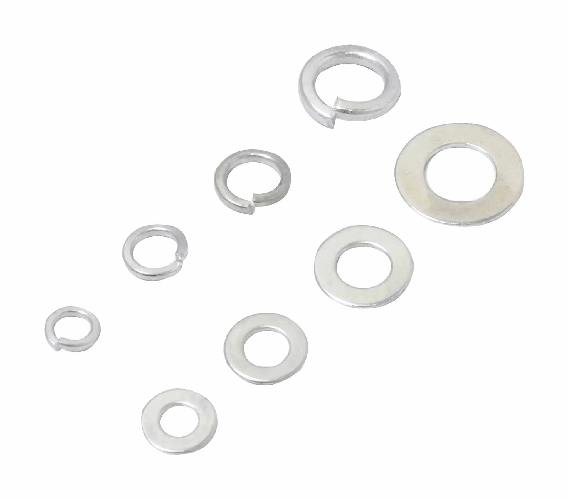 Several individual silver split spring washers and flat washers of different sizes laid out on white background.
