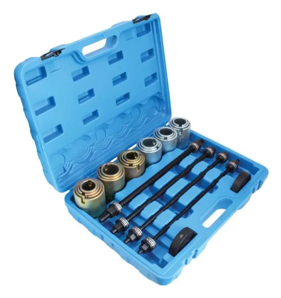 Angled shot of blue case showing graduated metal sleeves, four threaded rods and storage recesses