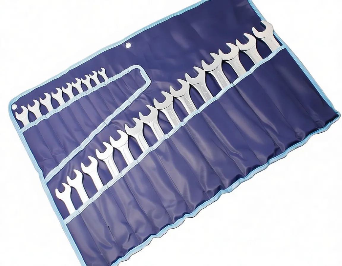 Close-up of a chrome combination spanner showing open jaw, 12-point ring end and stamped size marking '16' on the shaft.