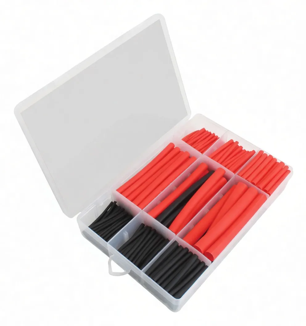 Angled view of a clear plastic organizer with red and black heat shrink tubes in separate compartments, lid open to show printed size and piece-count chart.