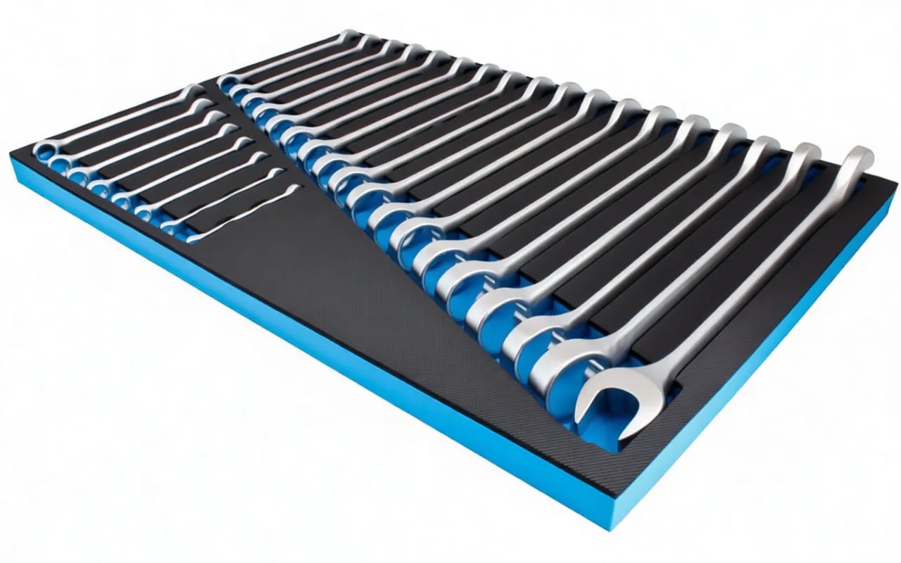 upright view of black and blue foam tray holding rows of chrome ratchet combination wrenches with ASTA logo