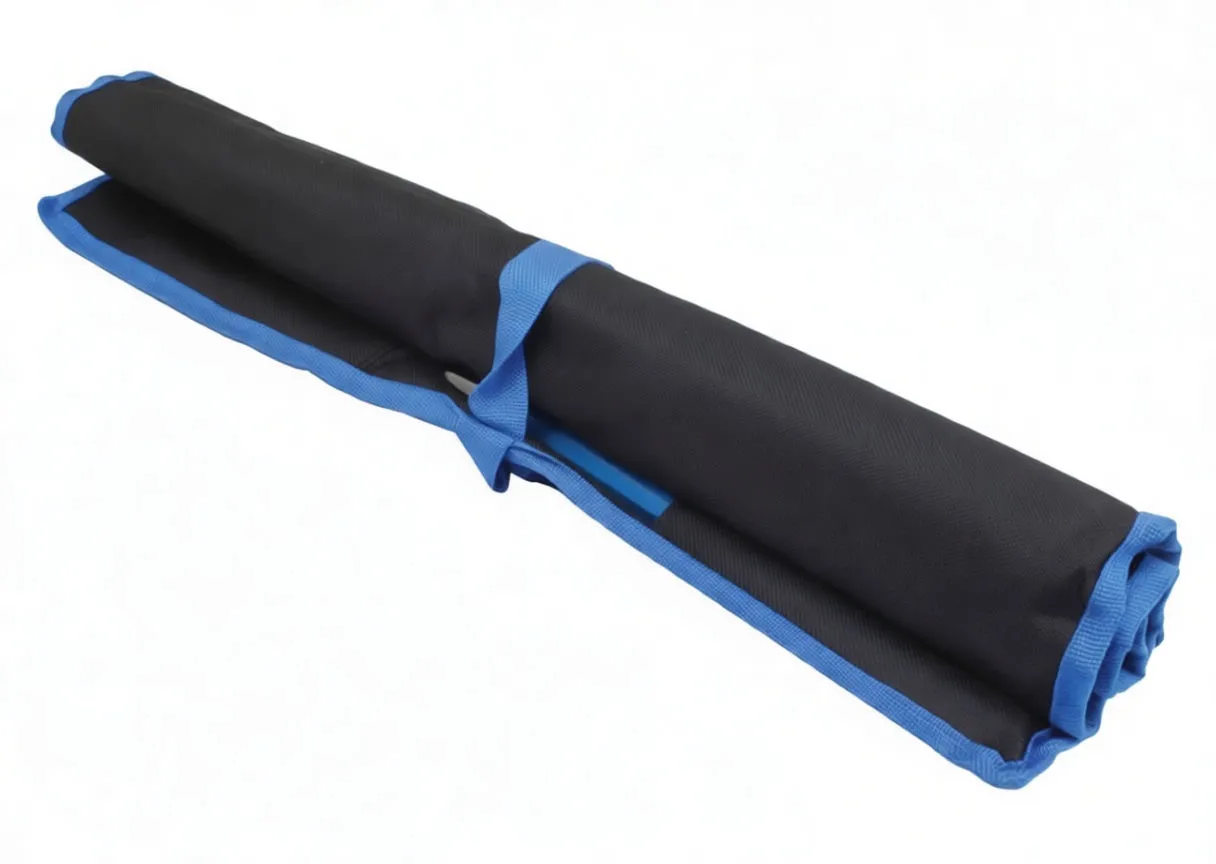 Layout of 28 individual punches and chisels — steel pin punches top, blue-handled chisels bottom, plus a small plastic gauge