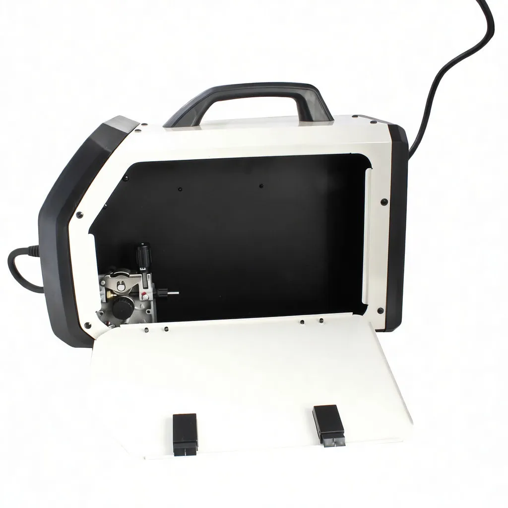 Open interior of welder showing spool mount knob, fold-down side door and wire feed area.