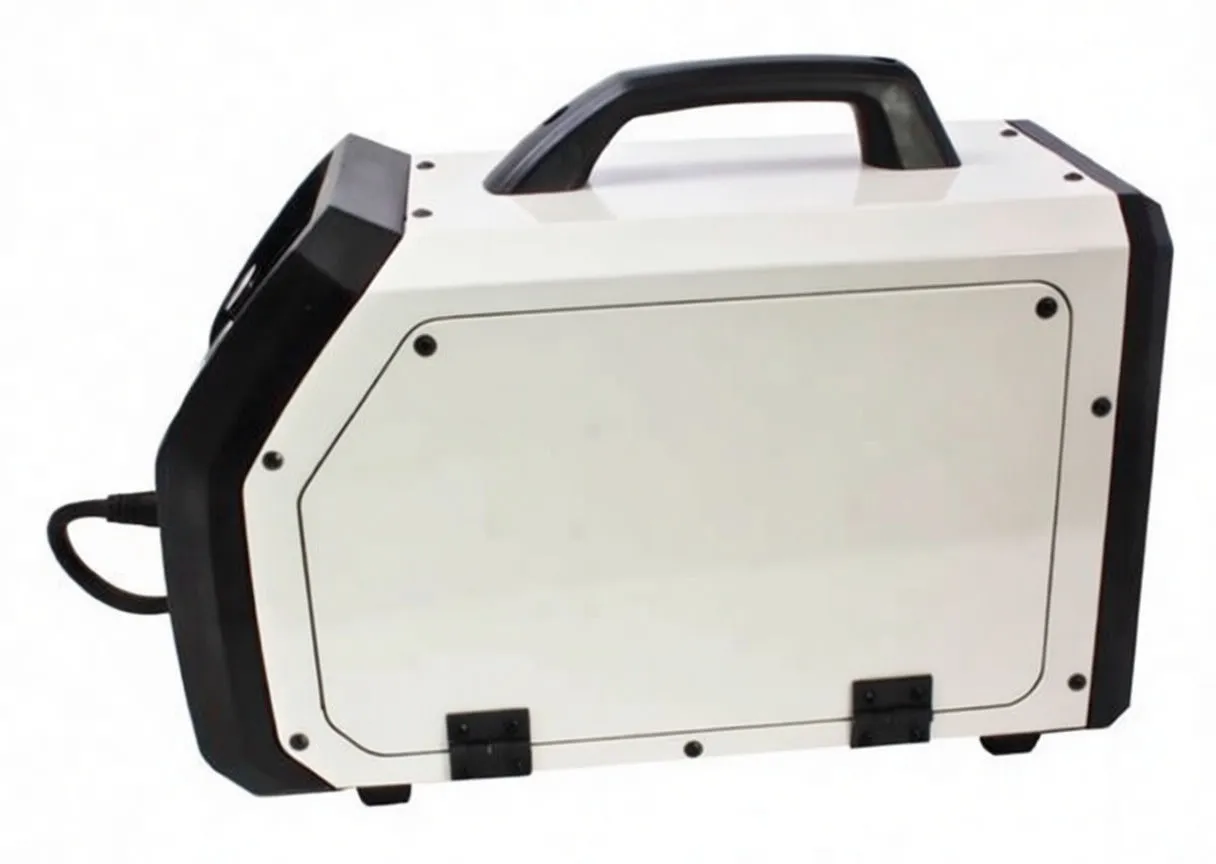 Side panel of welder showing saTra logo, side door hinges and top carry handle.