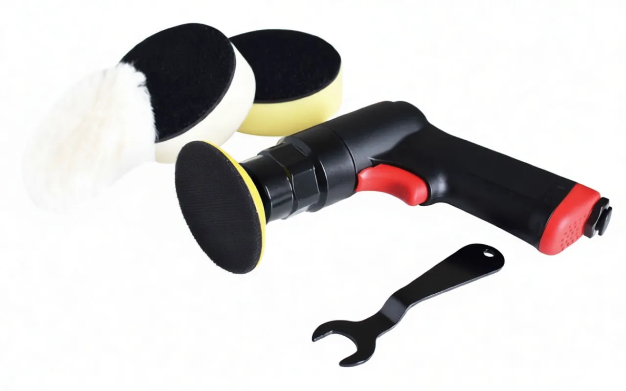 Handheld 3-inch air polisher with separate foam and wool pads and spanner wrench on white background
