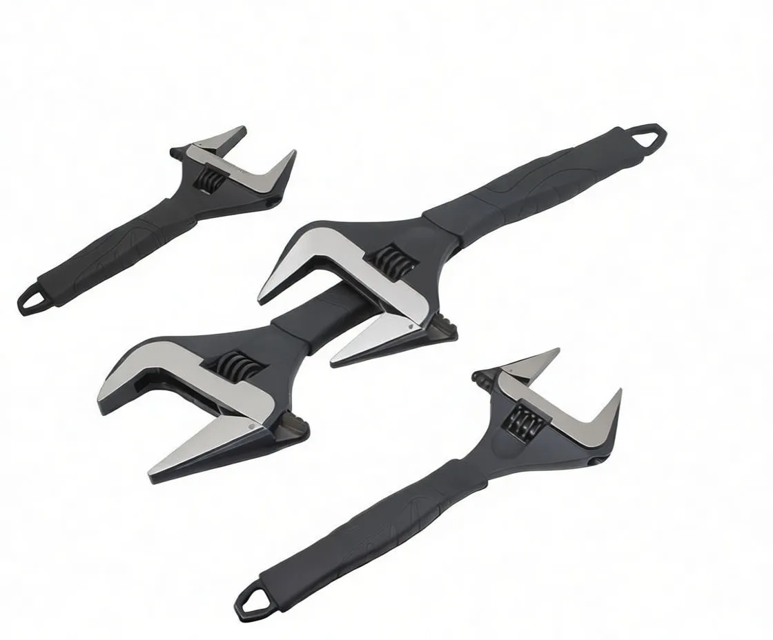 Close-up of three wrenches emphasizing wide jaws and the worm gear adjustment