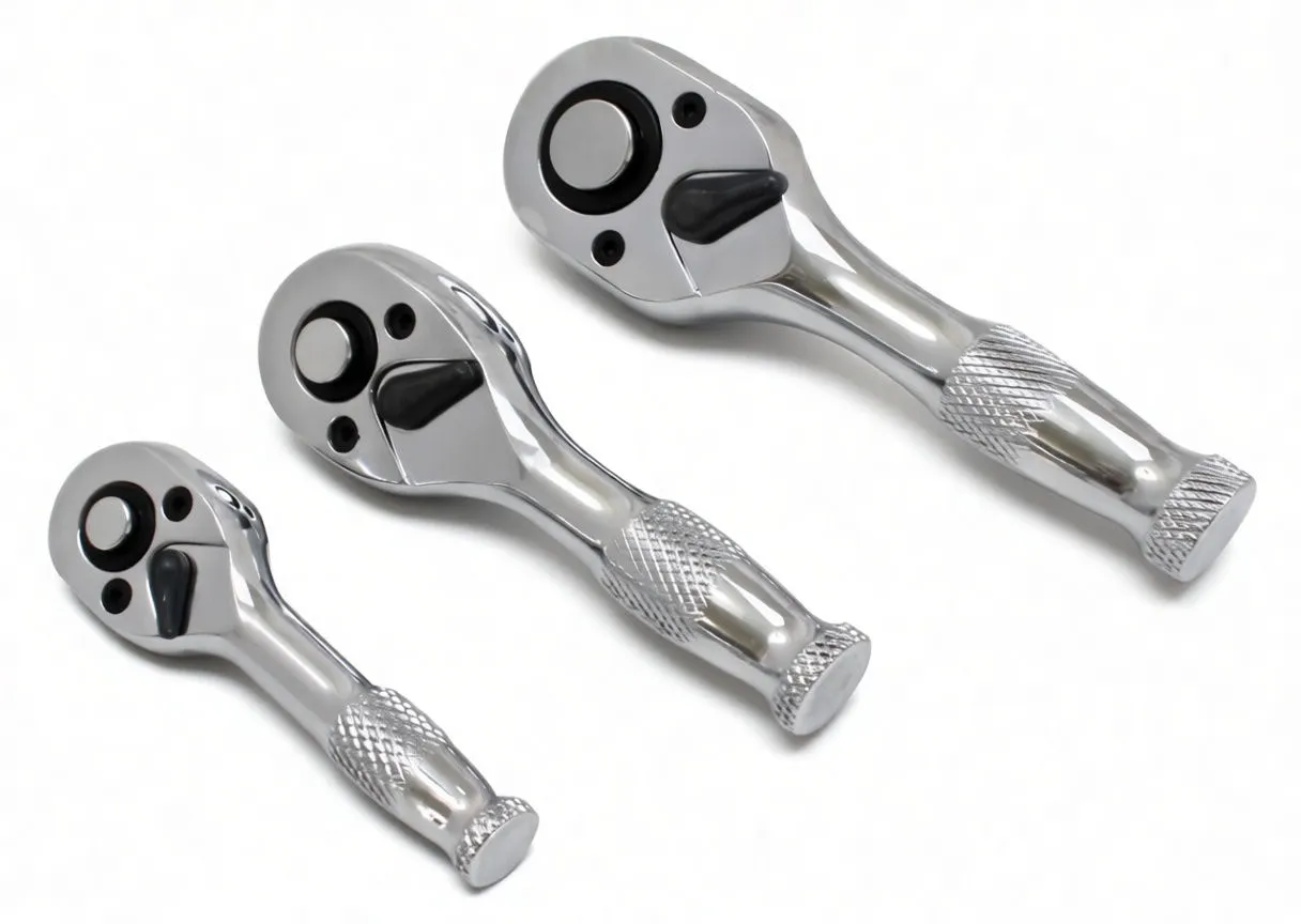 Three chrome reversible ratchet handles on white background showing heads and knurled grips