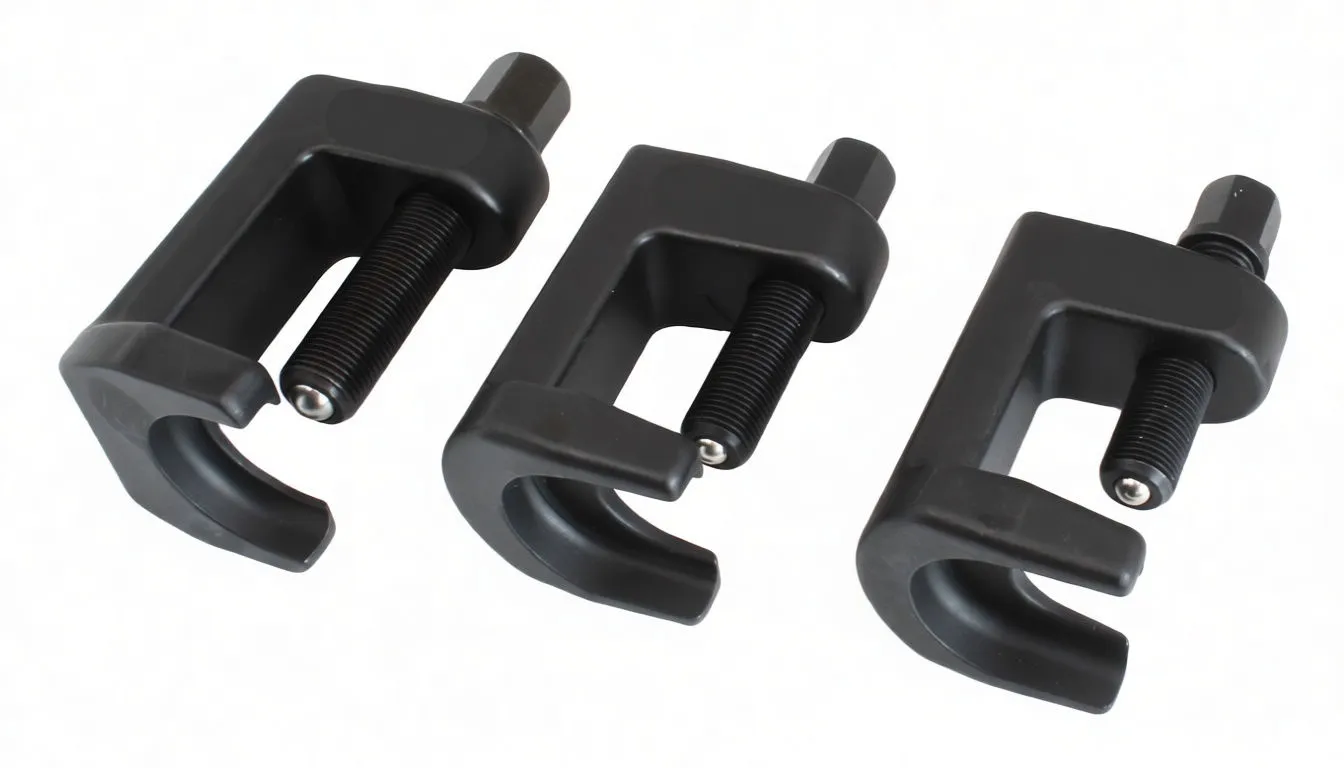 Three black C-frame ball joint pullers with threaded hex drive screws and white brand markings