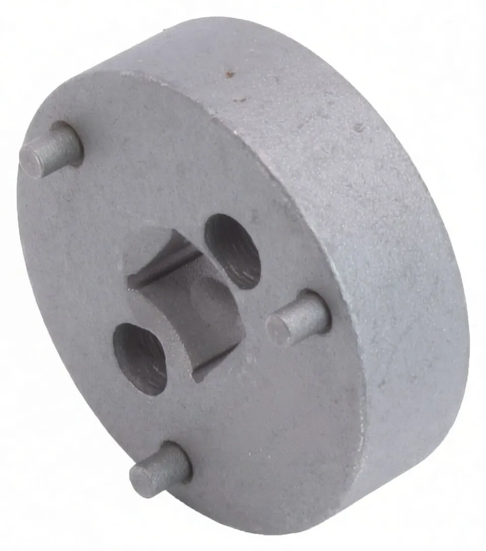 Side-angle view of round metal adaptor showing thickness, three pins, square drive socket and ASTA A-3PWB marking.