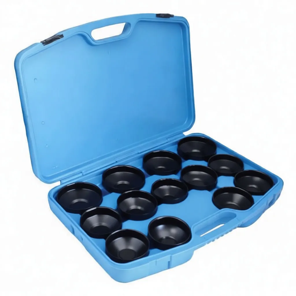 Angled perspective of blue case with assorted black oil filter cup sockets and a triangular adapter visible in lower tray