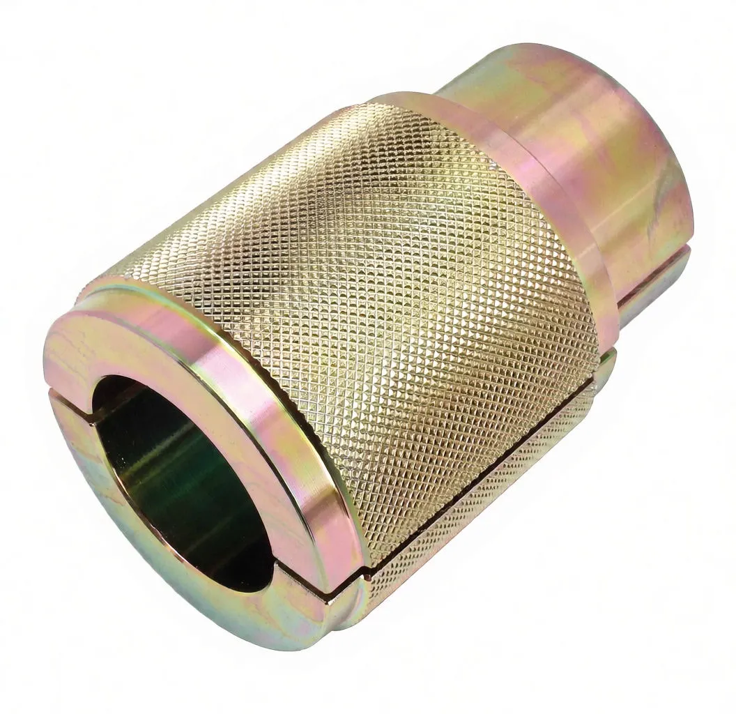 Oblique top view of knurled, gold plated 33MM fork seal driver showing inner bore, stepped collars and 33MM label