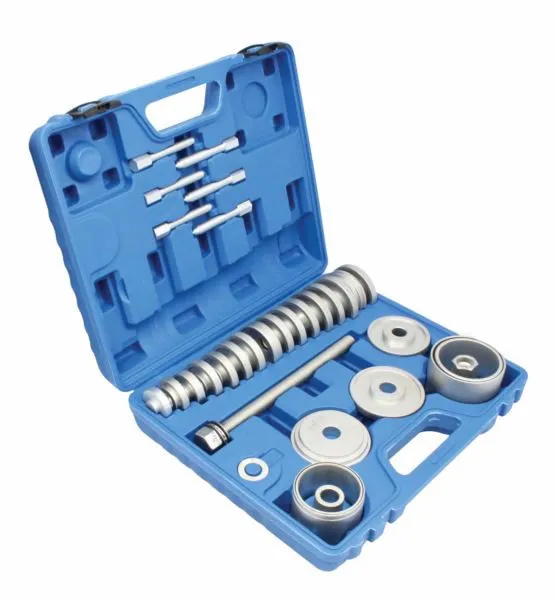 Oblique view of blue tool case with silver bearing cups, discs, threaded puller bar and hex drivers
