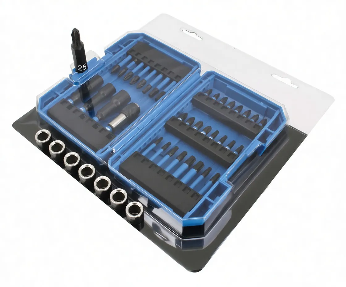 Flat overhead shot of the bit set showing socket adapters on left and multiple rows of torsion bits on right with white markings