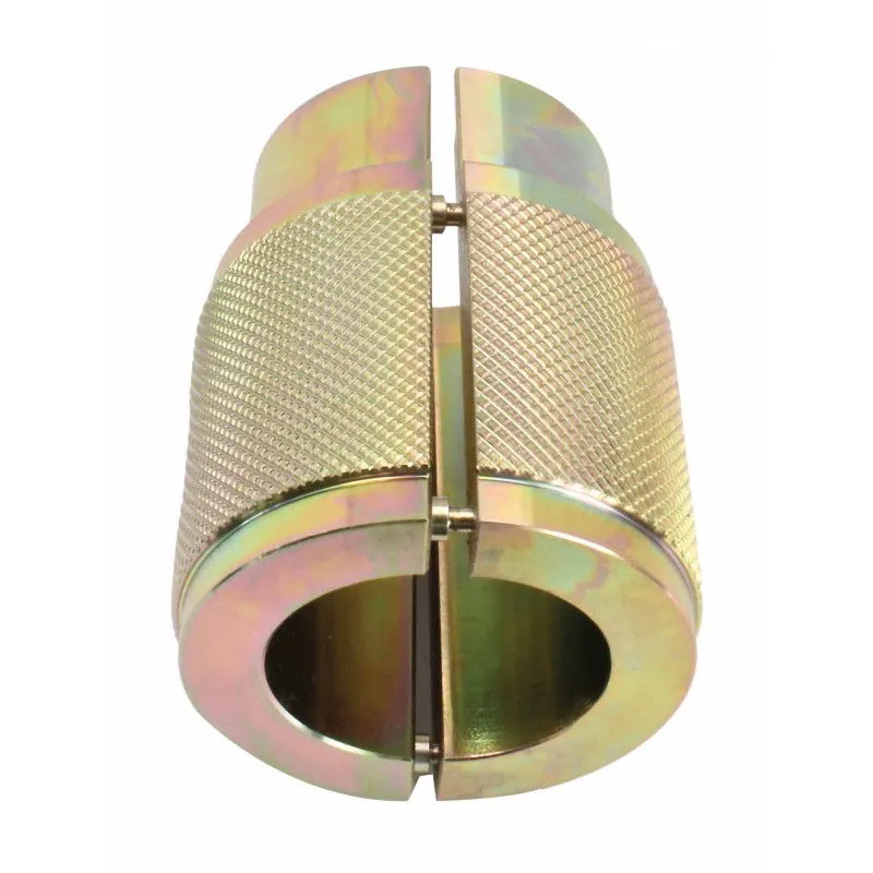 Front view into the 39mm internal bore of a split, knurled gold plated fork seal driver showing hinge pins and central split seam.