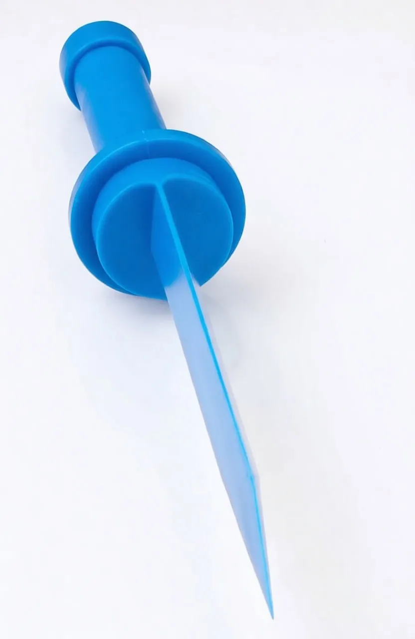 Close-up of one blue plastic scraper showing the cylindrical handle, finger guard flange and a long narrow chisel blade