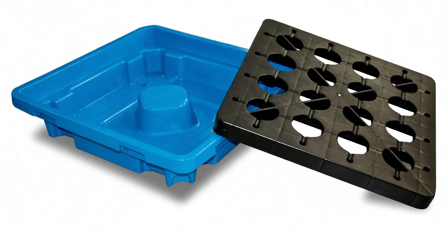 Blue drip tray with removable black grid placed beside it, showing interior sump, sloped floor channels and side drain fitting.