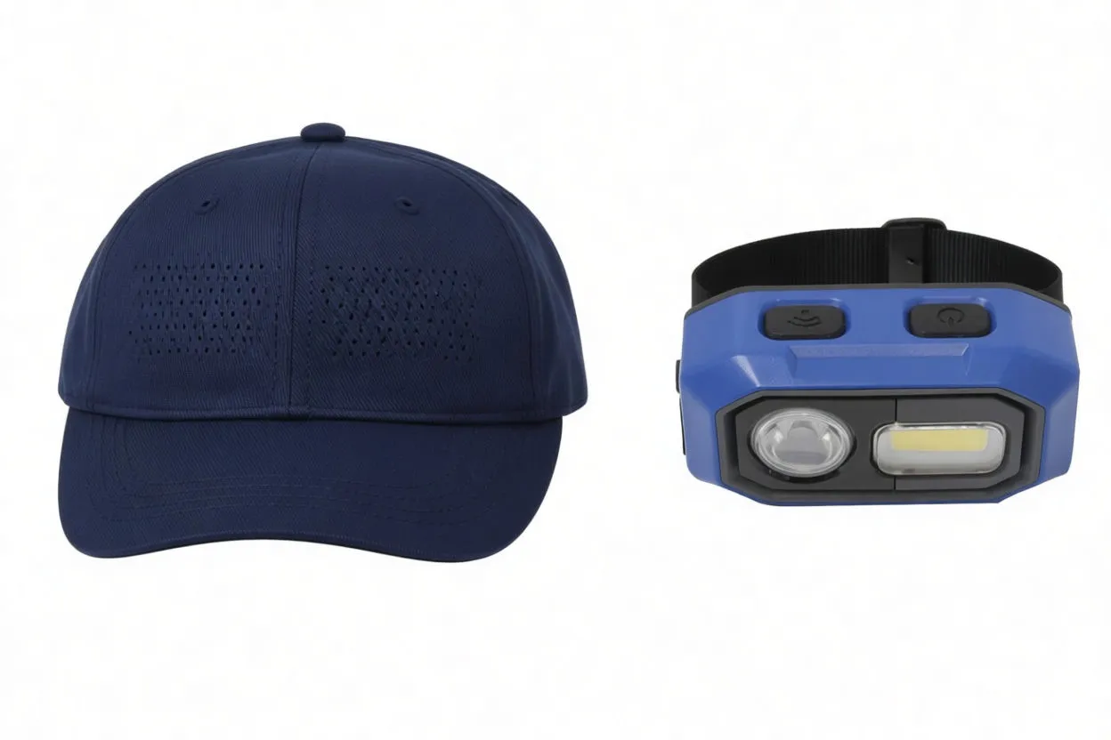 Close view of headlamp on cap showing two top rubber buttons (indicated by arrows) and ASTA-branded strap