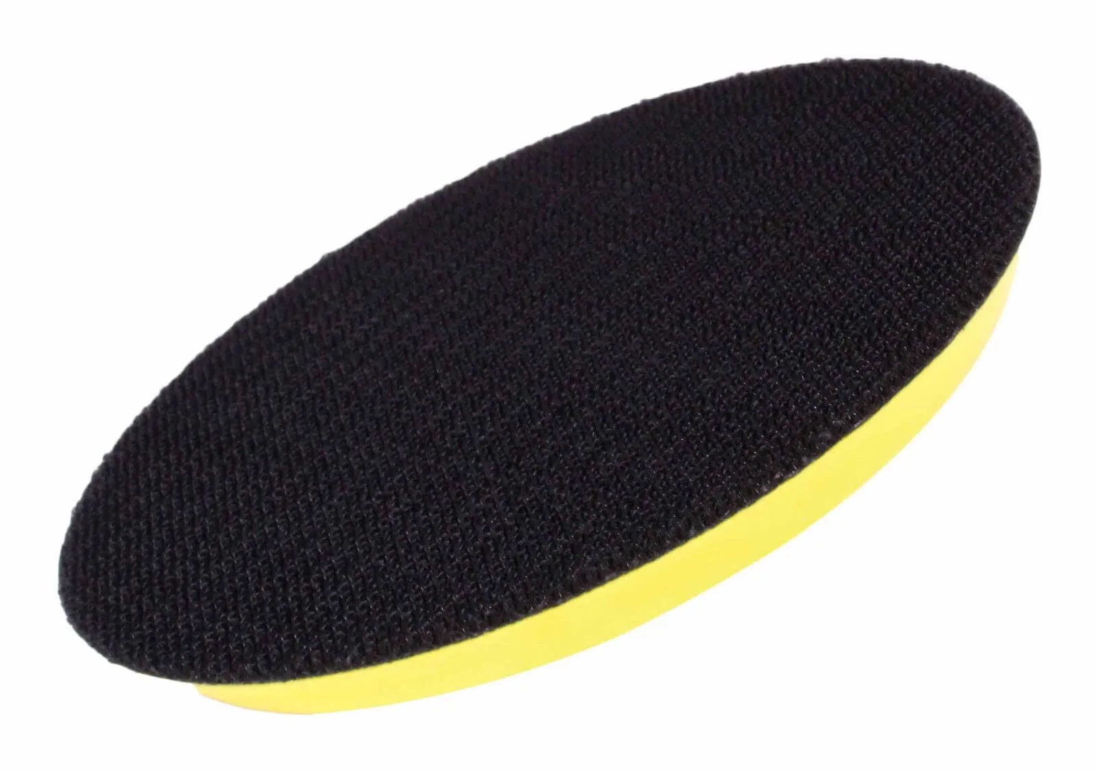 Angled view of sanding backing pad underside showing black hook-and-loop surface on yellow foam backing