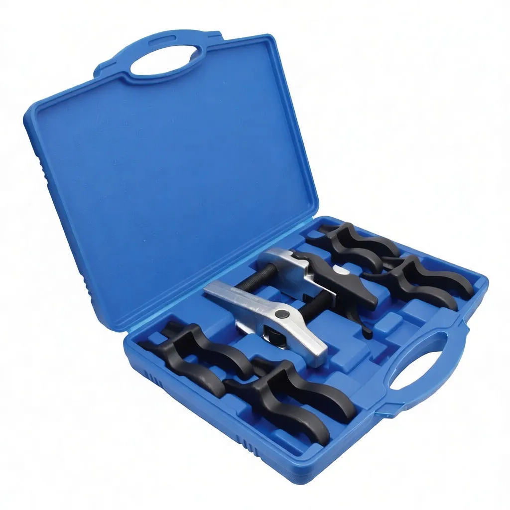 Separated components laid out: five black fork adapters and a silver two-bolt ball joint puller