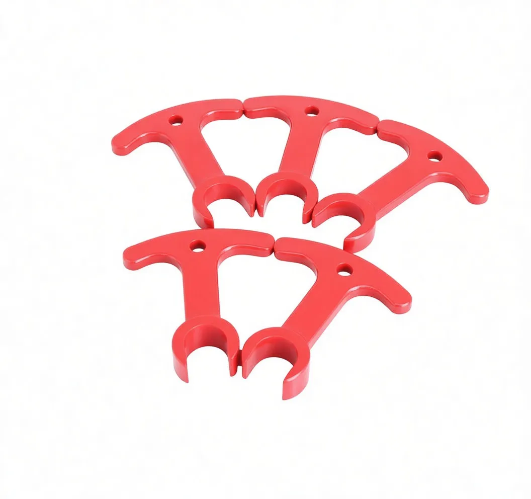 Close-up of single red camshaft spacer tool showing T‑handle, hole and 'ASTA A-CS5' marking