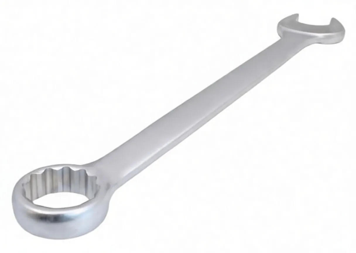 Low-angle shot of combination wrench showing box end with multi-point interior and long flat handle