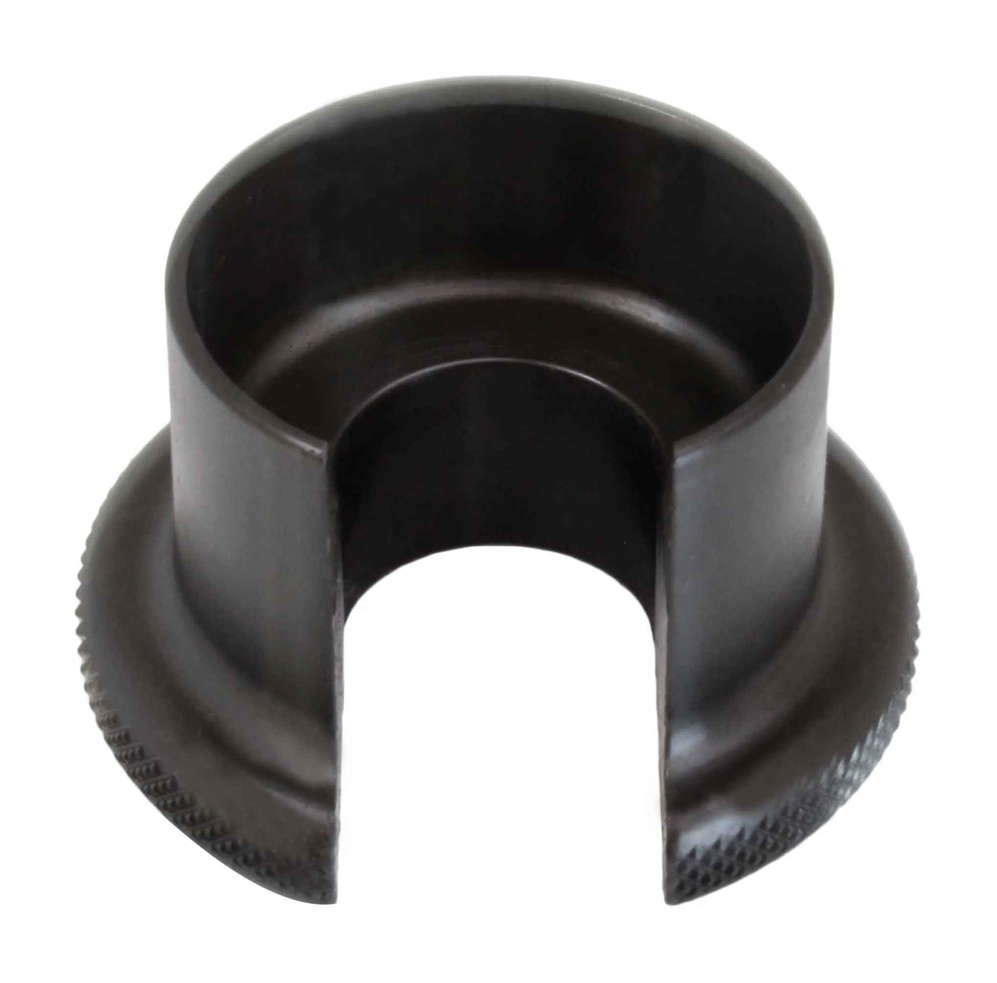 Top view of black metal seal-setting cup showing interior bore and U-shaped side cutout with knurled rim