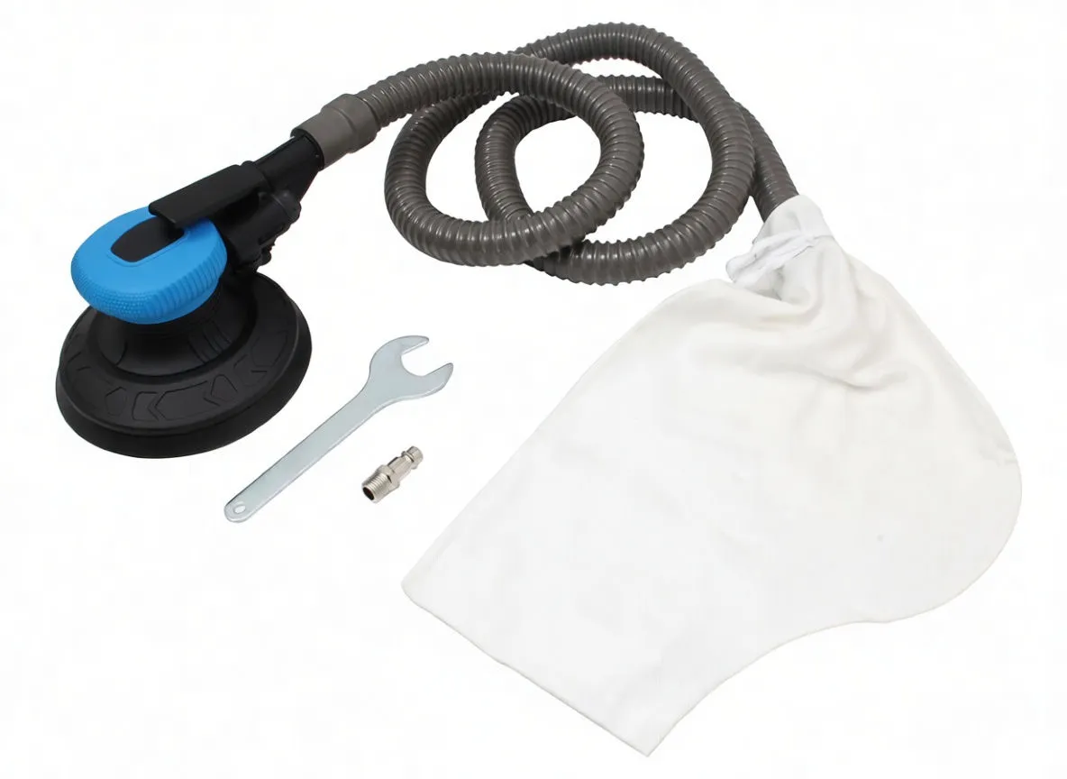 orbital sander with blue top, grey hose and dust bag laid out with wrench and metal fitting